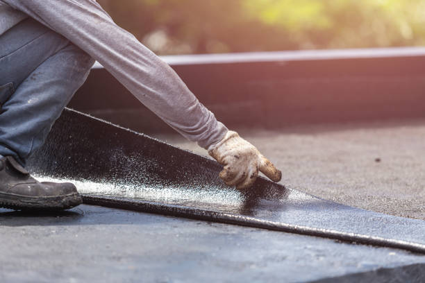 Professional Basement Waterproofing technician working in Hayden, AL